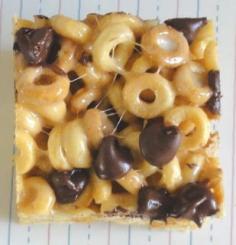Peanut Butter Cheerio Bars ingredients: 6 cups Peanut Butter Cheerios 2 Tablespoons butter 1/3 cup smooth peanut butter 10 ounces (approx. 40 ) regular sized marshmallows 1 cup chocolate chips Prep a 9×13 pan with cooking spray or buttered parchment. In a pan over medium high heat melt the butter and peanut butter. Add in the marshmallows until you get a nice gooey mess. Add the Peanut Butter Cheerios and stir to combine making sure all of the cereal gets coated. Press into the prepped pan and while the cereal is still warm, sprinkle the chocolate chips on top so they melt slightly. Let cool and cut into squares. These taste best if served the same day.