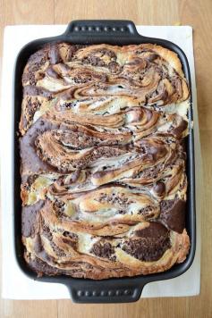 Earthquake Cake Recipe ~ Cake Ingredients 1 box German Chocolate Cake Mix (do not prepare as directed on box, prepare as directed below) 1/3 cup oil 3 eggs 1 and 1/3 cup water 2/3 cup shredded coconut 2/3 cup chocolate chips 1/2 cup chopped pecans 1/2 cup butter 8 oz cream cheese 1 pound powdered sugar (3 and 3/4 cups)