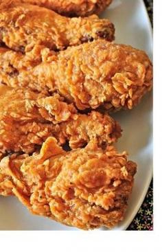 Extra Crispy Spicy Fried Chicken recipe from From Away 3 eggs 1/3 cup water 1 cup hot red pepper sauce (I like Louisiana Hot Sauce) 4 cups flour 2 teaspoon pepper 2 teaspoon paprika 3 teaspoons cayenne pepper 1 quart buttermilk (optional) Salt, Pepper, and Garlic Powder (to taste) 1 (1 to 2 1/2-pound) chicken, cut into pieces Peanut Oil, for frying