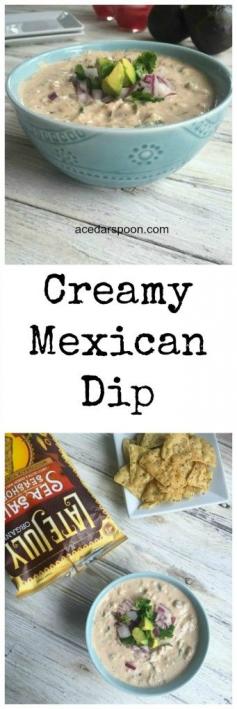 This Creamy Mexican Dip has all the flavors you like in your favorite Mexican dip: avocado, cilantro, red onion and salsa, but lightened up using Greek yogurt instead of sour cream. This makes the perfect, healthy appetizer at a party paired with chips or a topping for your favorite Mexican dish. // A Cedar Spoon