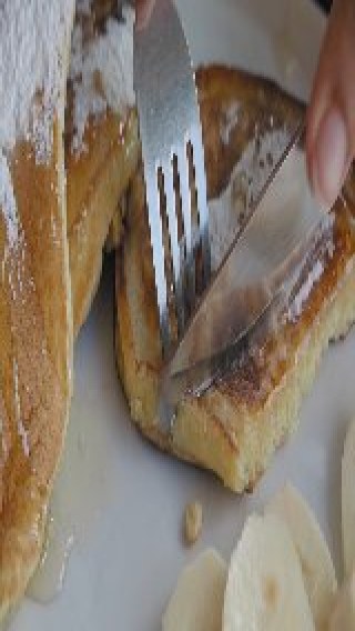 Close up of cutting pancake