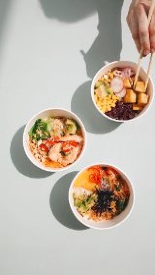 Three vibrant poke bowls
